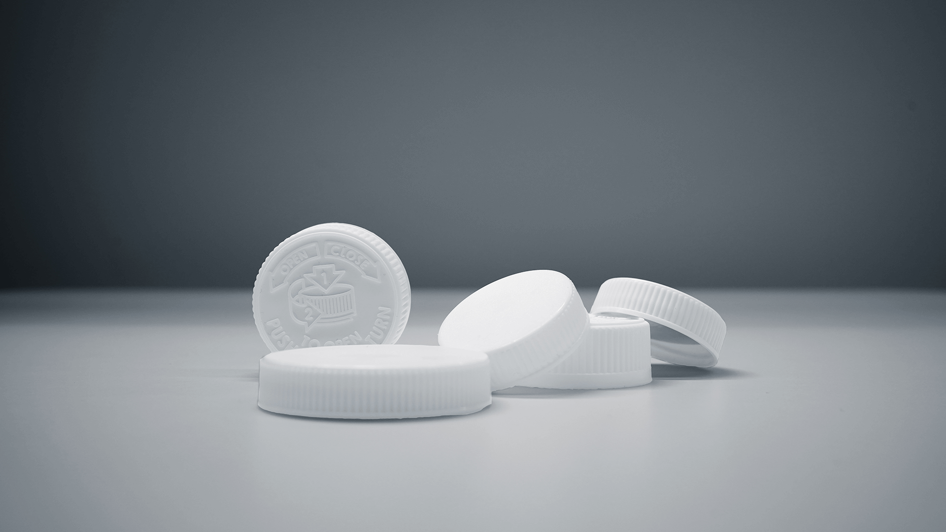 CHILD RESISTANT & CONTINUOUS TREAD CAPS